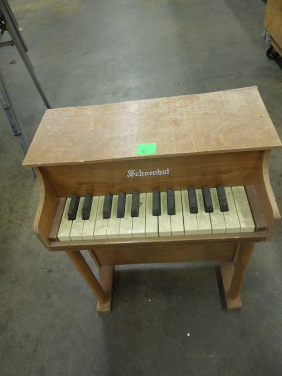 Schoenhut Toy Piano: Schoenhut toy piano, wood case, 25 keys, upright, all keys have sound. CONDITION: Some wear from age.
