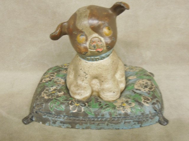 Hubley Fido Dog Doorstop: Hubley Fido Dog doorstop, on pillow, cast iron with DSCN Pat 1914 on back of head, hand painted, 6" x 7 1/2" x 6"h. CONDITION: Paint loss especially on pillow.