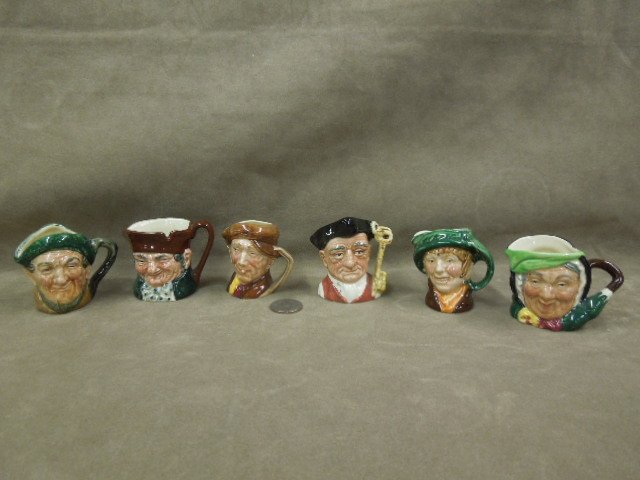 6 Royal Doulton Mini Toby Mugs: Six Royal Doulton miniature Toby mugs including: Old Charles, 2 1/4"h; "Arry" (brown hat), 2 3/8"; "Sorrey Gamp", 2 1/4", "Arry" (green hat), 2 3/8"; Goaler (Colonial Williamsburg), 2 5/8" h; & one un