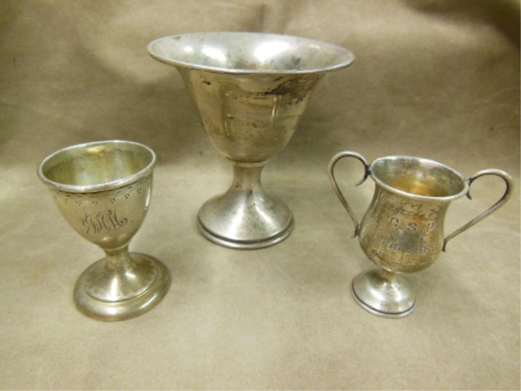 Sterling Tableware Group: Sterling tableware group, includes: 4 1/4" Sherbet; 2 3/4"h engraved and monogramed wine goblet; and a 3"h trophy cup inscribed "C.S.P 1856-1916". 4.79 ozts TW. CONDITION: No issues identified.