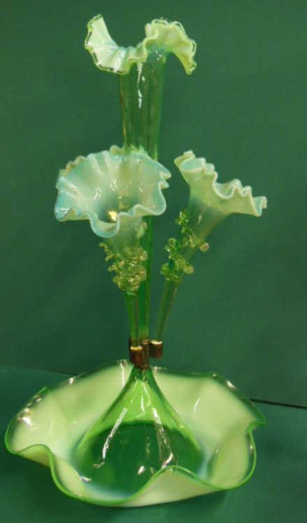 Victorian 4 Vase Epergne: Victorian 4 vase Epergne, green to opalescent glass, trumpet form vases, 3 with applied clear glass swirls, brass fittings, c 1880, H 22 1/2", D 12". CONDITION: No issues noted.