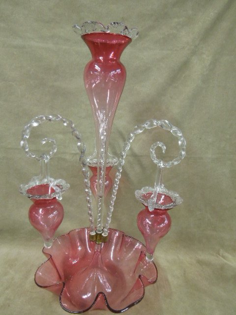 Victorian 4 Vase Epergne: Victorian 4 Vase Epergne, cranberry glass with 3 clear glass stems supporting 3 pendant vases, clear crimped glass borders on all 4 vases, brass fittings, circa 1880, h 22 1/4", d 11 1/2". CONDITION: 