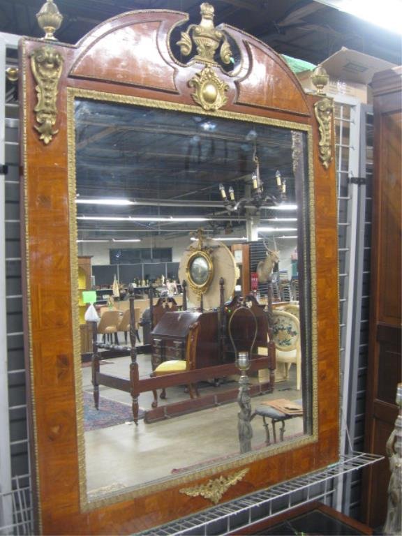 Louis XVI-Style Wall Mirror: Louis XVI-style wall mirror, parquet wood frame with brass borders, medallions, urn & acorn mounts & finials; early 20th C. 39 1/2" x 54 1/2". CONDITION: Normal wear.