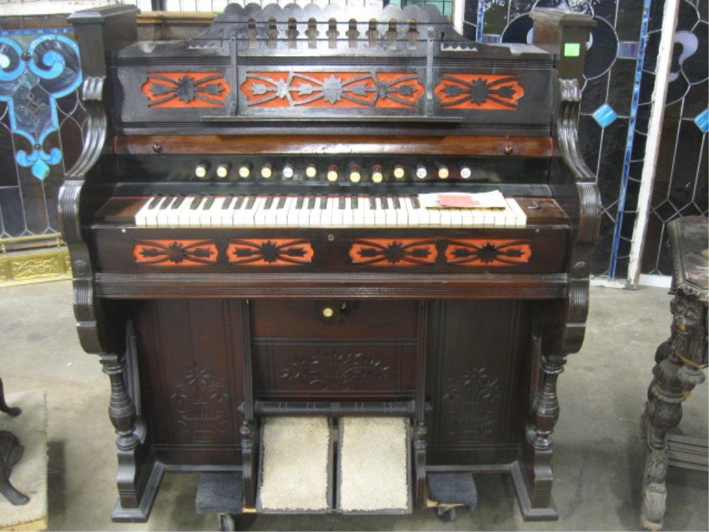 Eastlake Victorian Pump Organ: Eastlake Victorian Pump Organ, Walnut with cut out & incised embellishments, 13 stops, late 19th C 44" x 48" x 23" CONDITION: playing condition