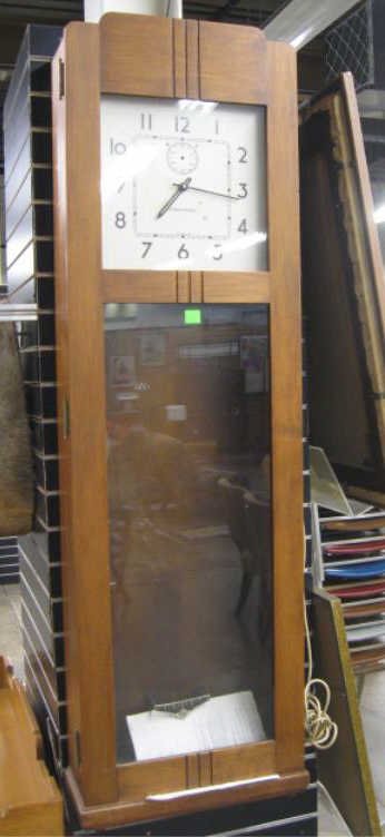 IBM (International) Time Clock: IBM (International) time clock, Art Deco=style hardwood case, painted tin dial, electrified, c 1929, 19 1/2" x 62 1/2" x 8 1/4" CONDITION: refinished condition: running condition unknown, missing 2nd