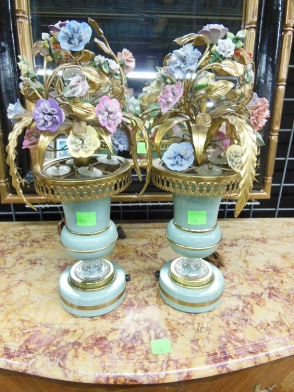 Pair of Urn Garnitures: Pair of urn garnitures, brass & glass with turquoise enameling featuring multi color porcelain flowers & glass rosettes, mid 20th C., height 18 1/2". CONDITION: No issued identified.