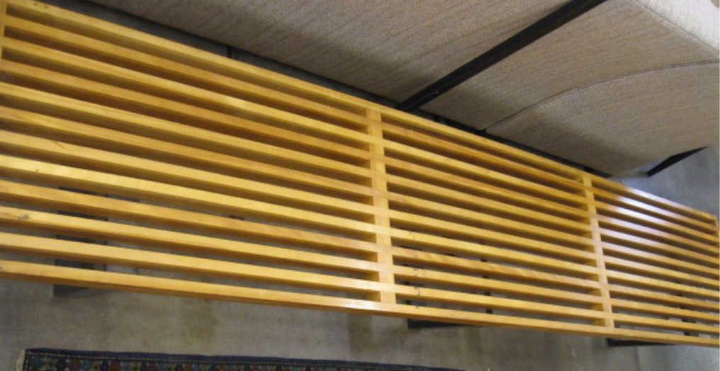 Mid-Century Modern Slat Bench: Mid-Century modern slat bench, light wood slat top on three trapezoid ebonized wood base frames, 18 1/2" x 92 1/4" x 14". CONDITION: Areas of gunny residue on top slats.