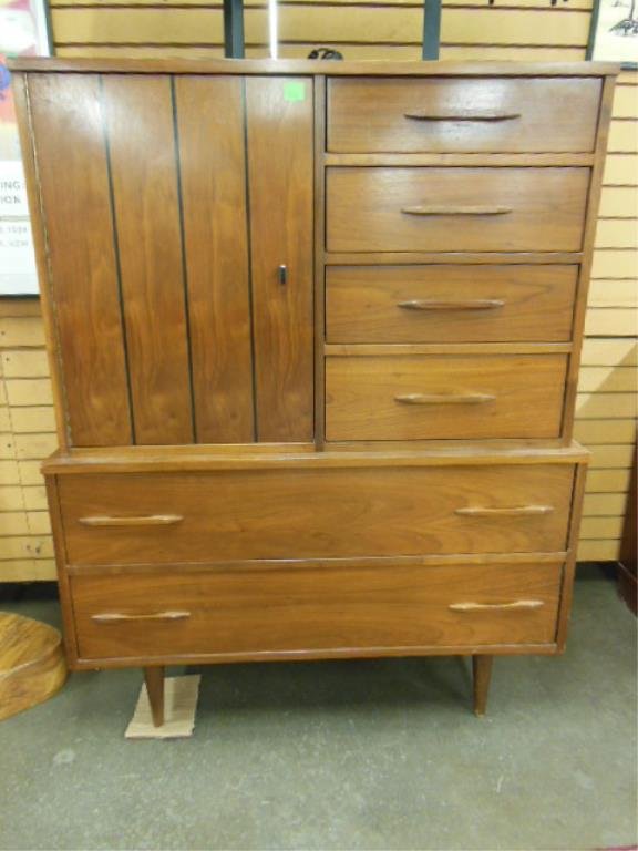 Danish Modern Chifferobe: Danish modern chifferobe, walnut with ebonized highlight & wood pulls, tapered cylinder legs, c 1960-70. 62" x 20" x 52 3/4". CONDITION: Normal wear.