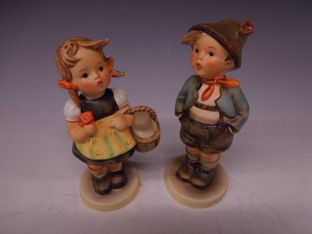 2 Hummel Figurines: Two Hummel figurines, Brother, #95, 5 3/4" h; & Sister, #98/0, 5 1/2"h, both Mark 3. CONDITION: No chips, cracks, minor crazing on both people.