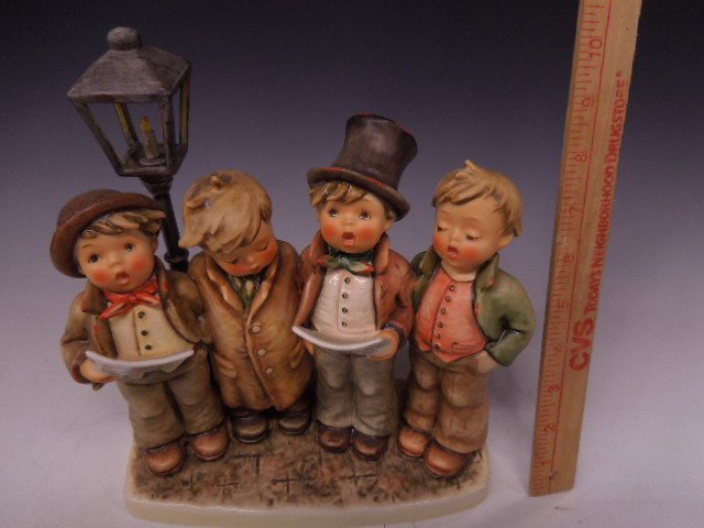 Hummel Figurine Harmony in Four Ports: Hummel figurine Harmony in Four Ports, #471, Mark 6, Century Collection 1989 XX signed YCW 882 & Ro 89, 9 3/4"h with original box. CONDITION: No chips, cracks or crazing.
