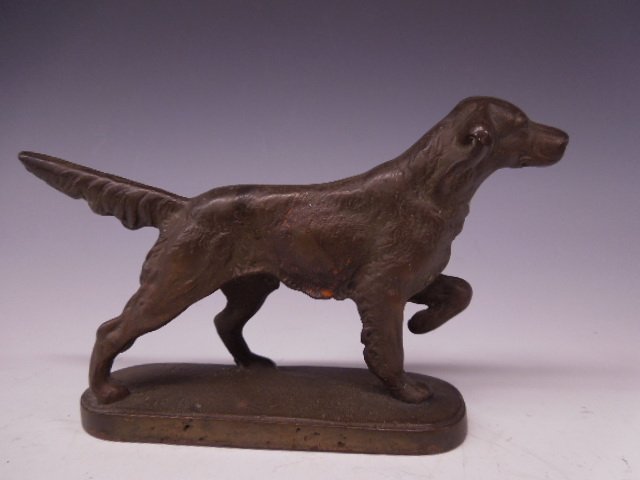 Cast Iron Pointer Dog Doorstop: Cast Iron Pointer dog doorstop, bronze coated, unmarked, 7 3/4"l x 4 1/2"h Condition; good, minor wear