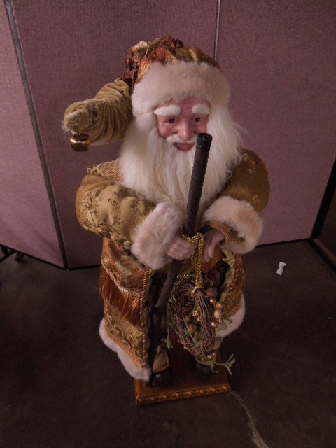 Standing Santa Figure: Standing Santa figure, hard plastic face and hands, faux fur and cloth coat and hat, with tree branch staff, wreath and pocket watch 42"hCondition; some wear to figure
