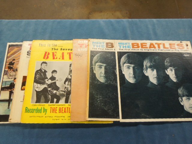 9 Beatles LPs: Lot of nine vintage Beatles LPs, including: "Meet The Beatles" (2) T2047, "Introducing The Beatles" Vee-Jay-LP1062, "Savage Young Beatles" Savage-BM69, "The Beatles Second Album" - Capitol - T2080, "s