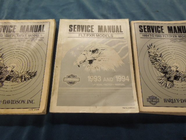 3 Harley Davidson Service Manuals: 3 Harley Davidson Service Manuals including; (1) 1984 - 1990 FLT/FXR models, (1) 1993 - 1994 FLT/FXR models and (1) 1984 - 1989 FLT/FXR models Condition; minor wear, especially on covers
