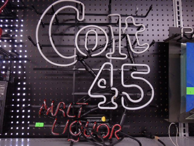 Colt 45 Malt Liquor Neon Sign: Colt 45 Malt Liquor neon sign. Measures: 19 1/2 " wide x 24" tall x 7" deep. CONDITION: Not working ' "L" is broken.