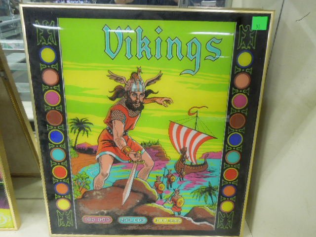 Framed Vikings Glass Game Machine Back: Framed Vikings glass game machine back. Measures: 20" wide x 22" tall x 3/4" deep. CONDITION: Good.