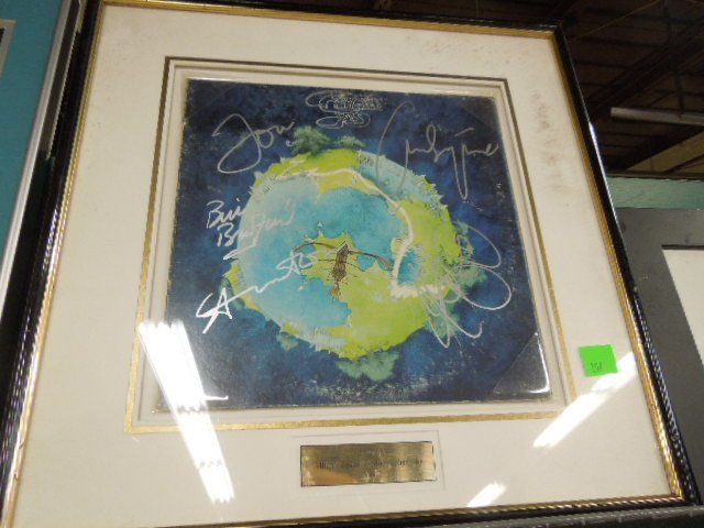 "Fragile" Autographed Album Cover by Yes: "Fragile" autographed album cover by Yes. Framed five signatures. No C.O.A. CONDITION: Fair.