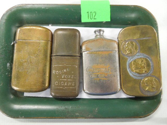 4 Vintage Pocket Match Holders: 4 Vintage pocket match holders including; (1) with 3 coin (Washington, Lincoln, Columbus) 1 1/2" x 2 7/8", (1) Clarkson & Ford (Oil men) flask form 1 1/2" x 2 5/8", (1) Rosina Vokes Cigar (removable l