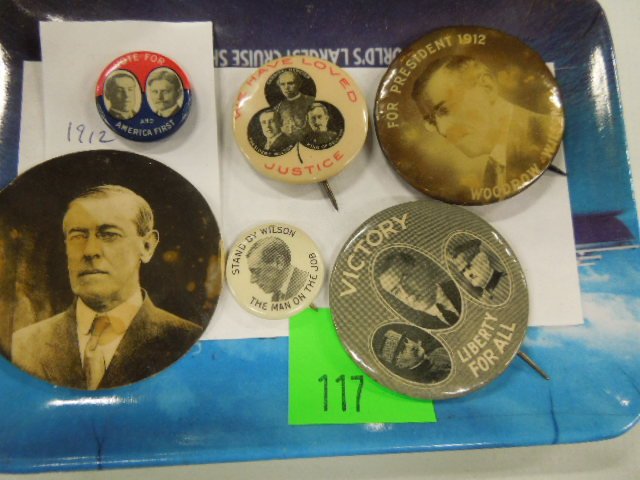 Wilson Campaign Buttons & Photo: Woodrow Wilson campaign buttons (5) 5/8" to 1 3/4"d, "for President", "Victory", "We have loved Justice", The Man on the Job" and "America First", plus 2" round photo (looks like cut out for button Co