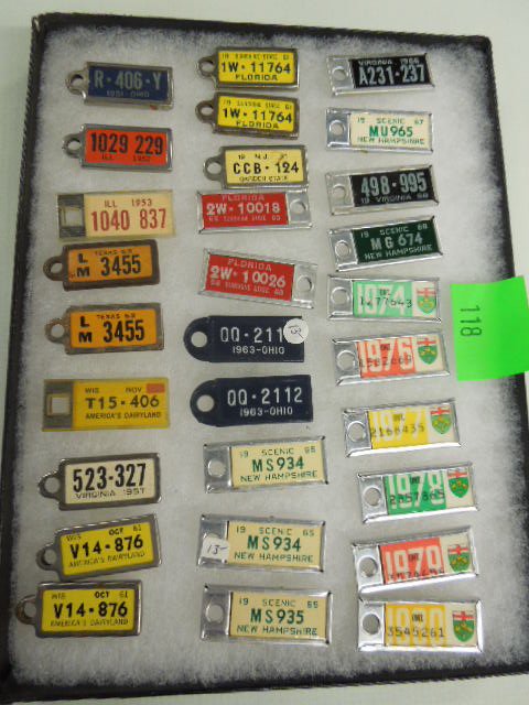 29 Keychain License Fob Tags: 29 Keychain License Fob Tags 1950's - 1980 including Ohio, Illinois, Texas, Florida, New Hampshire, plus (6) Ontario, Canada Condition; some wear from age