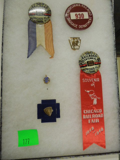 6 Assorted Railroad Pins & Buttons: Six assorted railroad pins & buttons, including: two railroad Centennial buttons (1848-1948) Chicago, Ill (with ribbons), two years of service railroad pins, PRR Keystone pin & Pennsylvania Railroad b