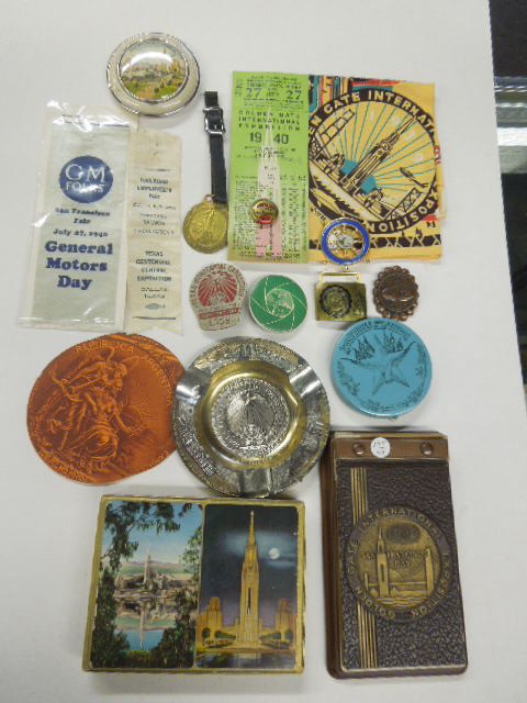 Assorted Exposition Souvenirs: Assorted Exposition souvenirs, including: 1939 Golden Gate International Exposition, handkerchief, playing cards, ships wheel pin, fob & compact, 1936 Texas Centennial Exposition contractors pin, rail