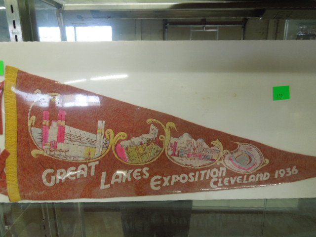 Great Lakes Expo Pennant: Great Lakes Exposition pennant, 1936 featuring Automotive, Horticultural buildings, Cleveland Mommoth Stadium, 27" Condition; moderate overall wear, pinholes in end ties, small piece at end missing