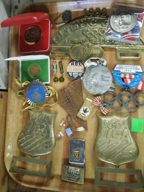Lot Olympic metal items: Lot Olympic metal items including; medals, pins, commemorative , lighter and other, 1960's - 1980's Condition; no issues noted