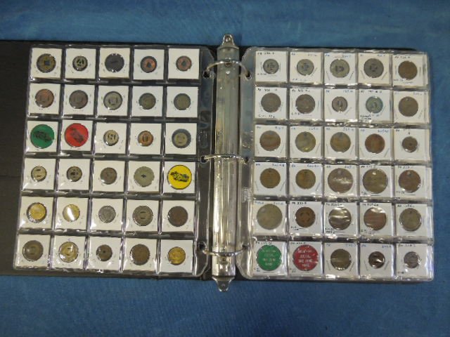 180 Transportation Tokens in Binder: 180 Transportation tokens in binder, including: bus, trolley, bridge, many obsolete, all in cardboard sleeves behind plastic. CONDITION: No issues identified.