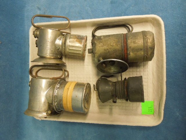 Lot of Four Small Miner's Lanterns: Lot of four small miner's lanterns by: Just Rite, Trouble Proof & Baldwin. CONDITION: Fair, some may be missing parts.