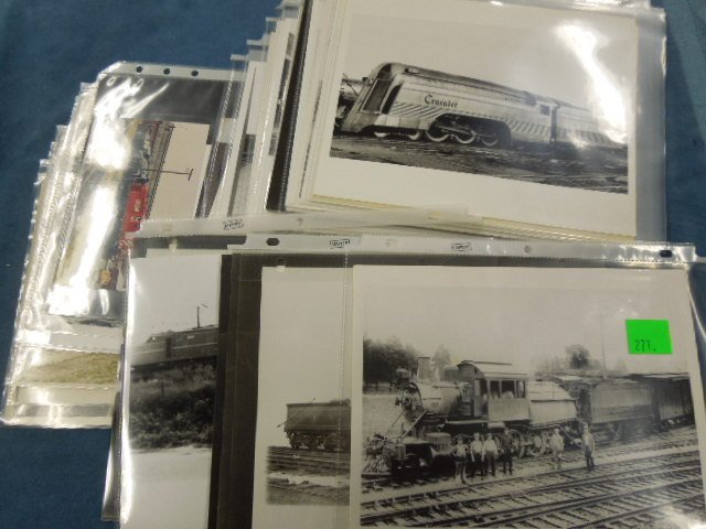 45+ Train Engine & Other Photos: 45 + train engine & other photos, approximately 8" x 10", most black & white including: three train wreck photos, some smaller photos, some with people & stations. CONDITION: Minor wear.