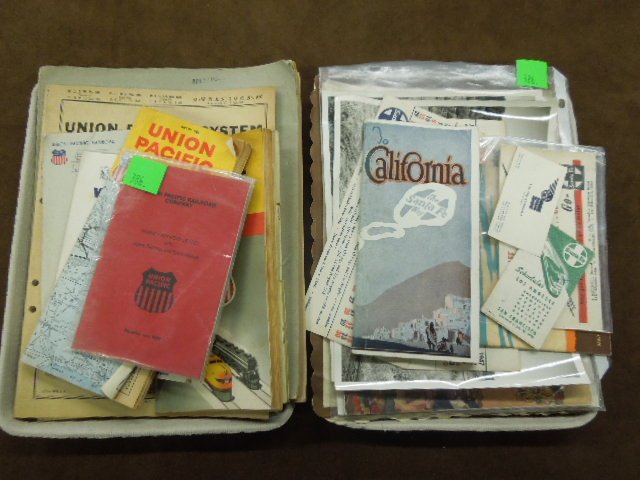 Vintage Santa Fe/Union Pacific Ephemera: Two trays, assorted vintage Santa Fe; Union Pacific railroad time tables, advertising booklets, photos, etc., early to mid-20th C. [approx. 25 pieces]. CONDITION: Normal wear consistent with age & use