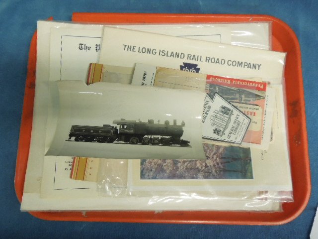 Pennsylvania RR Ephemera: Tray lot, Pennsylvania railroad ephemera: Notices to employees; General Office Library bookplate; locomotive & tender vintage photos; PRR police Academy certificate of attainment; Long Island RR condu