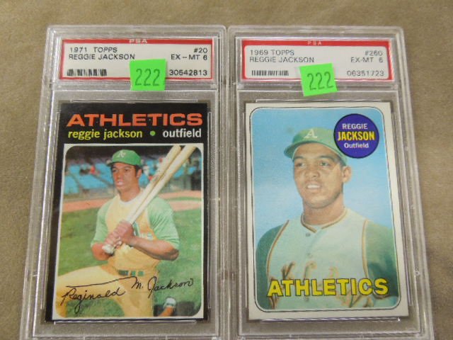 2 Topps Reggie Jackson BB Cards: Two Topps Reggie Jackson baseball cards, including: 1969 (Rookie Card), 1st full year, card #260, PSA graded EX-MT6, #06351723 & 1971, card #20, PSA graded EX-MT 6, #30542813, both in hard plastic cas