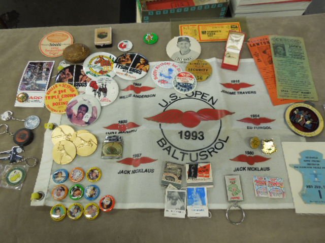 Assorted Sports Items: Assorted sports items including: baseball, football, boxing, golf, racing, matchbooks, pins, keychains, buttons, Indy 500 cardboard badge back, (10) 1984 baseball pins, 1993 Golf U.S. Open Flag, small