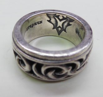 Stephen Webster .925 Rotating Ring: Stephen Webster .925 Rotating Ring, man's ring from "The Thorn" Collection, The vine motif rotates around the wide band. Name and "W" inscribed inside. Size 10 3/4, .70ozt. CONDITION: Exterior band ha