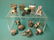 12 Victorian Figural Napkin Rings