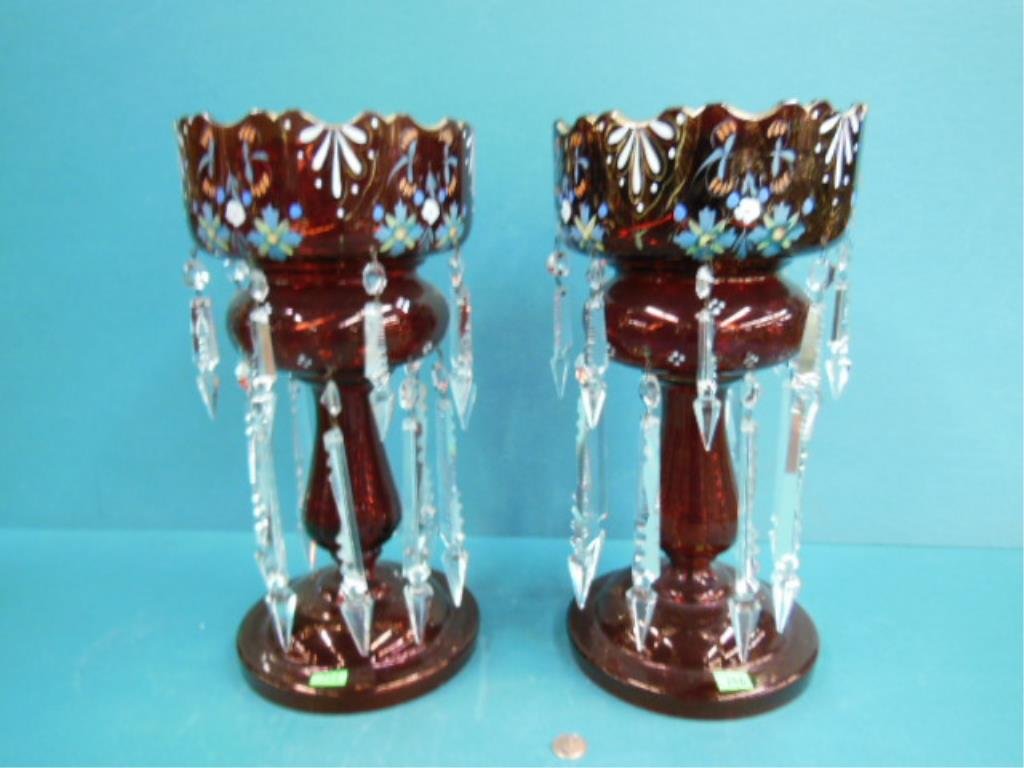 Pr Victorian Ruby Glass Lustres: Pair of Victorian Lustres, ruby glass urn form with scalloped tops, floral enameling & two tiers of cut crystal spears, late 19th C, height 14". CONDITION: Slight gilt loss to scalloped crest rim, min
