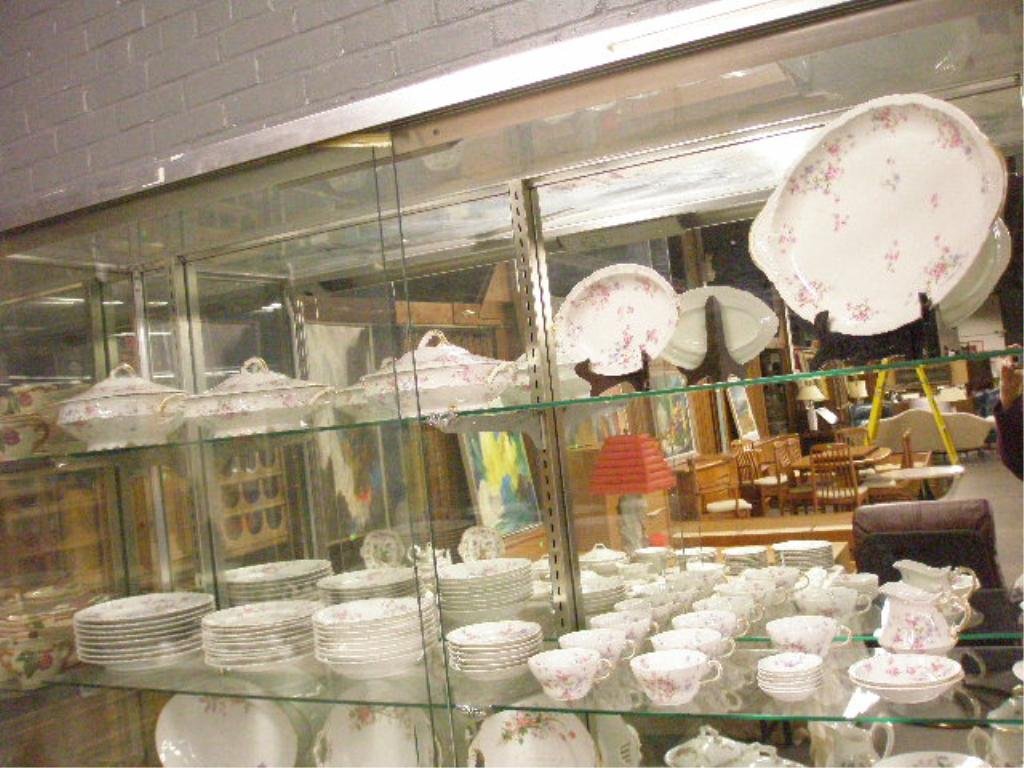 Antique Theodore Haviland China Set: Antique Theodore Haviland Limoges 51 piece china set, transfer floral design, (9) 8" salad plates, (8) 9 1/2" dinner plates, (8) 7 1/4" soup bowls, (7) cups, (6) saucers, (6) butter pats, creamer, but