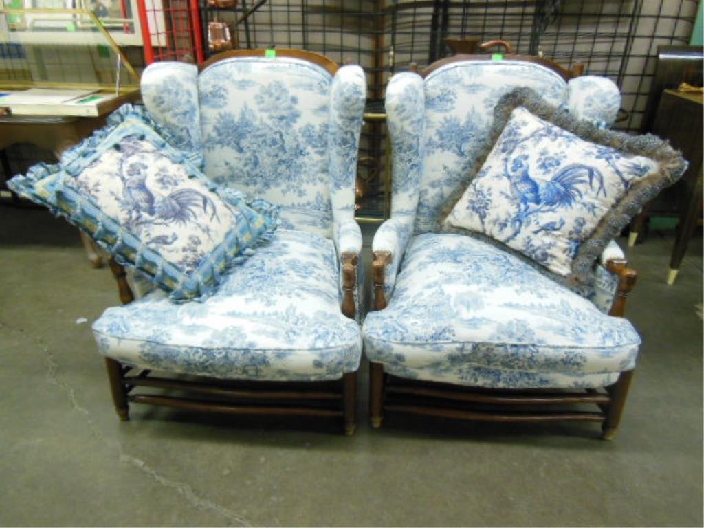 Pr Country French Wing Chairs: Pair of Country French wing chairs, walnut, shaped ladder backs, turned arm supports & legs with stretchers, blue & white figural & scenic printed cloth upholstery with two rooster print custom pillow