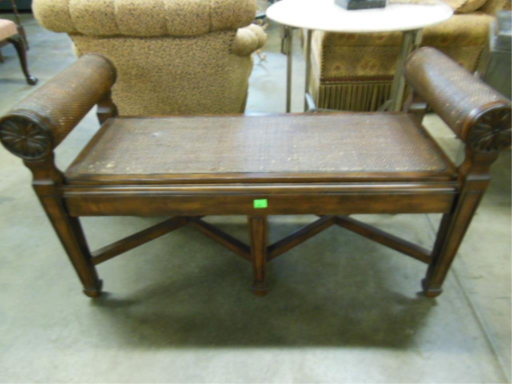 Fireside Bench: Fireside bench, Classical style, with caned seat & rolled arms having rosette ends, late 20th C., 47 1/2" x 26 1/2" x 19 1/2". CONDITION: Loose joints.