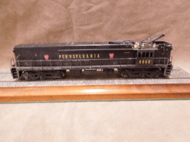 Alco HO Scale PRR Locomotive: Alco HO Scale PRR Locomotive engine #4444. CONDITION: Fair, foam residue on engine, rear drive disconnected, no box.