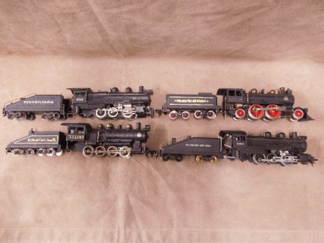 Lot of four HO Scale Locomotives: Lot of four HO Scale Locomotives includes: (2) Made by Aristo Craft and (2) Only marked P10024. CONDITION: Fair, used, some pcs. may have minor damage.