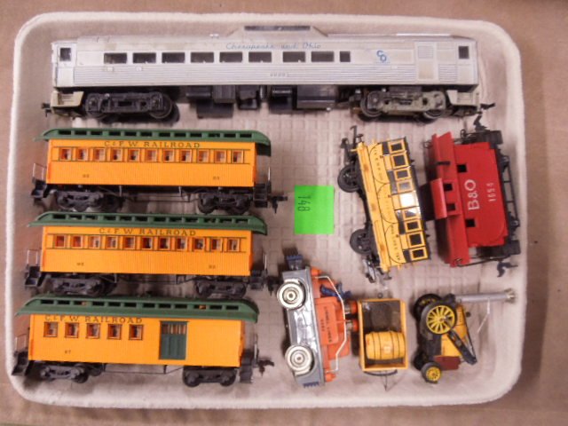 Misc. lot of HO-Scale Train Cars & Other: Misc. lot of HO-Scale train cars and other includes: passenger cars, caboose, etc. CONDITION: Fair, used.