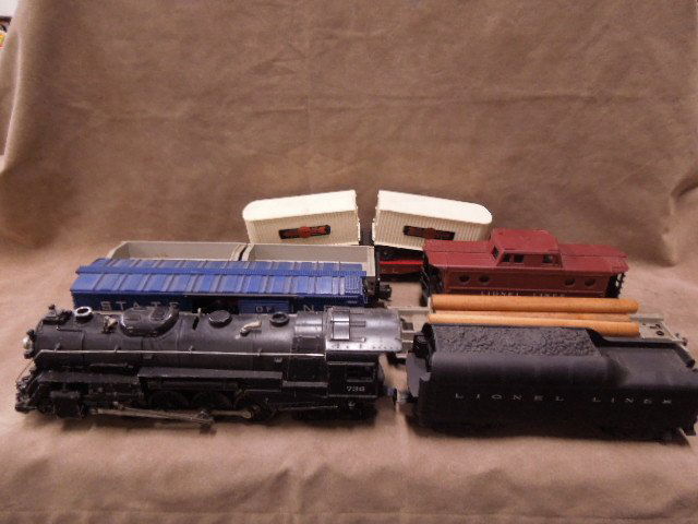 Lionel O-Scale 1957 "First To Make The Run-O" Set: Lionel O-scale 1957 "First To Make The Run On Super-O" set, includes: #736 Berkshire, whistle tender #2046W, #3494-275 operating boxcar, 3336IX operating lumber car, #643 flat car, #335 955 twin dump