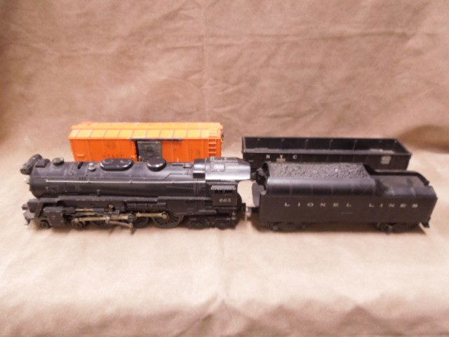 Lionel O-Scale Train Lot: Lionel O-scale train lot, includes: #665 engine & tender, #63132 A.T. & S.f. boxcar, #6462 NYC Gondola. CONDITION: Fair, used.