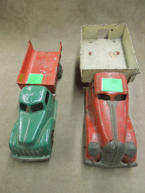 Hubley Kiddie & Other tin truck: Hubley Kiddie Toy tin dump truck, #476, green cab, red bed, push lever dump, 9 1/2" and "Lumar Coal Co." tin truck, re body, white dump back with lever lift back dump Condition; Hubley missing back be