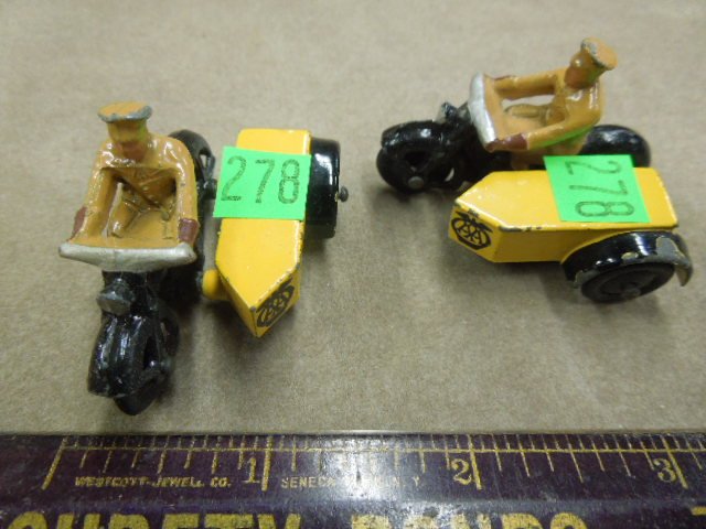 2 Dinky A.A. Motorcycle Patrol, #270: Two Dinky A.A. motorcycle patrol, #270, black motorcycle with yellow side car tool box, tan uniform on man, #270 A.A. emblem on front, 1 13/16" no boxes, mid century. CONDITION: Some minor paint loss,