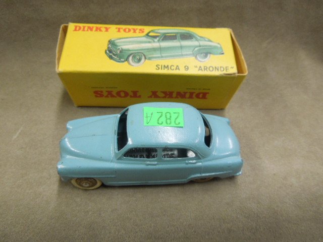 Dinky Toy Car, #24 U: Dinky toy car, #24 U, made in France, Simca 9 "Aronde", blue with white tires, with original box, 3 5/8", mid century. CONDITION: Minor wear to box & car.