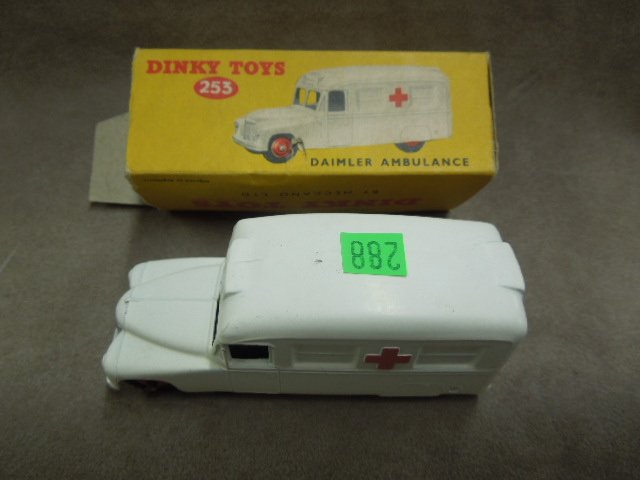 Dinky Toy Ambulance, # 253: Dinky Toy, #253, Daimko ambulance, white with red cross on sides, original box, 4", mid century. CONDITION: Box missing one outer flap, also one inner flap, ambulance has minor paint loss & wear.